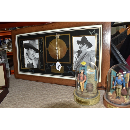 443 - A GROUP OF JOHN WAYNE RELATED COLLECTORS ITEMS to include a ten DVD boxset collection, two glass dom... 