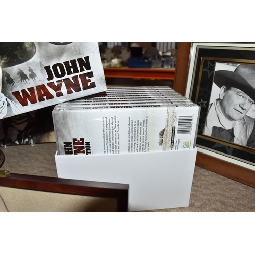 443 - A GROUP OF JOHN WAYNE RELATED COLLECTORS ITEMS to include a ten DVD boxset collection, two glass dom... 