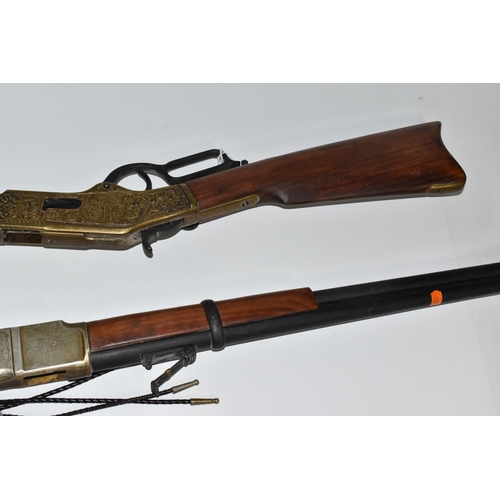 444 - TWO REPLICA RIFLES AND BOLO TIES comprising a replica Winchester '73' rifle 1973  by Denix as used b... 