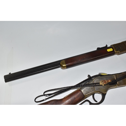 444 - TWO REPLICA RIFLES AND BOLO TIES comprising a replica Winchester '73' rifle 1973  by Denix as used b... 