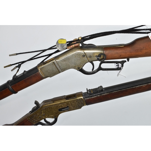 444 - TWO REPLICA RIFLES AND BOLO TIES comprising a replica Winchester '73' rifle 1973  by Denix as used b... 