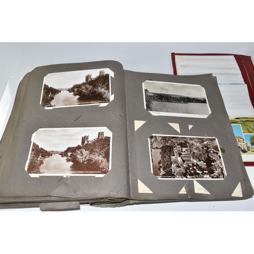 445 - TWO ALBUMS OF POSTCARDS to include one album comprising approximately two-hundred early twentieth ce... 