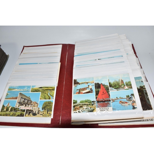 445 - TWO ALBUMS OF POSTCARDS to include one album comprising approximately two-hundred early twentieth ce... 