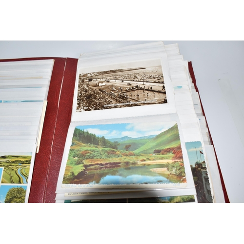 445 - TWO ALBUMS OF POSTCARDS to include one album comprising approximately two-hundred early twentieth ce... 