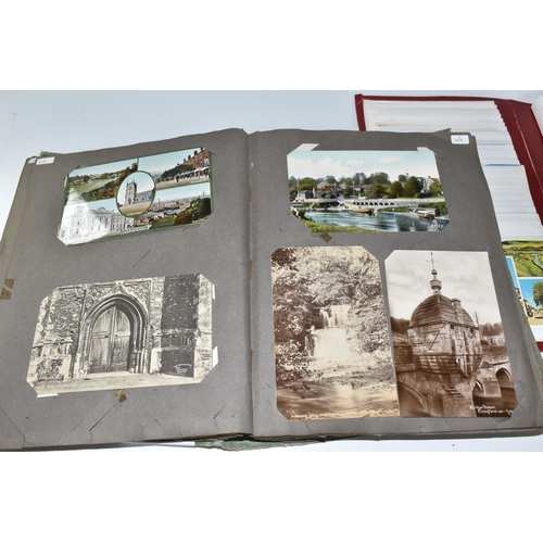 445 - TWO ALBUMS OF POSTCARDS to include one album comprising approximately two-hundred early twentieth ce... 