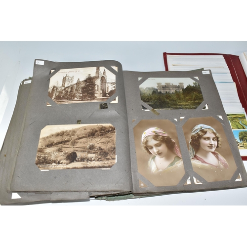 445 - TWO ALBUMS OF POSTCARDS to include one album comprising approximately two-hundred early twentieth ce... 