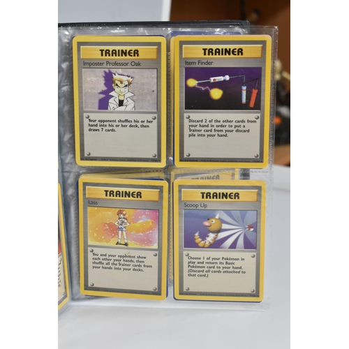 448 - TWO FOLDERS OF POKEMON CARDS, includes cards from the Base Set, Jungle, Fossil, Team Rocket and Prom... 