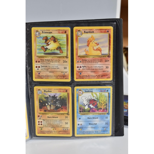 448 - TWO FOLDERS OF POKEMON CARDS, includes cards from the Base Set, Jungle, Fossil, Team Rocket and Prom... 