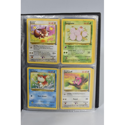 448 - TWO FOLDERS OF POKEMON CARDS, includes cards from the Base Set, Jungle, Fossil, Team Rocket and Prom... 