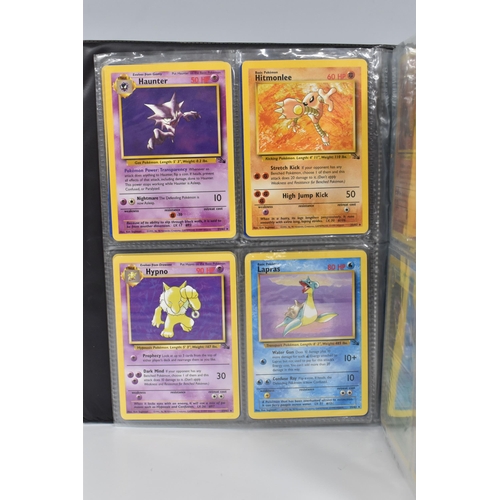 448 - TWO FOLDERS OF POKEMON CARDS, includes cards from the Base Set, Jungle, Fossil, Team Rocket and Prom... 