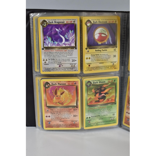 448 - TWO FOLDERS OF POKEMON CARDS, includes cards from the Base Set, Jungle, Fossil, Team Rocket and Prom... 