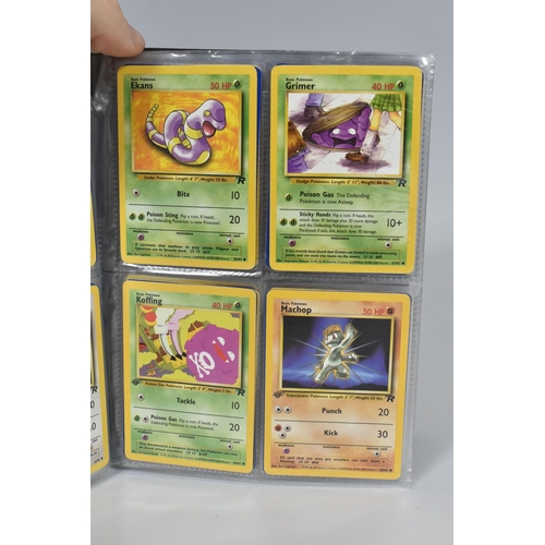 448 - TWO FOLDERS OF POKEMON CARDS, includes cards from the Base Set, Jungle, Fossil, Team Rocket and Prom... 