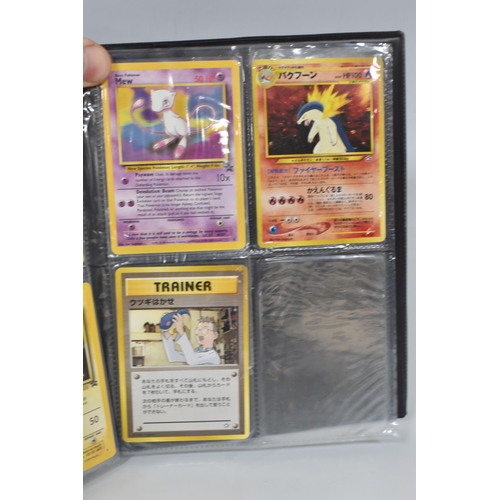 448 - TWO FOLDERS OF POKEMON CARDS, includes cards from the Base Set, Jungle, Fossil, Team Rocket and Prom... 