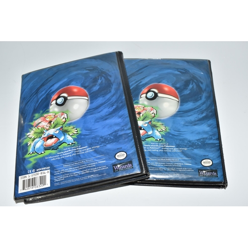 448 - TWO FOLDERS OF POKEMON CARDS, includes cards from the Base Set, Jungle, Fossil, Team Rocket and Prom... 