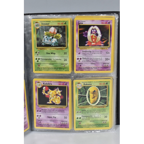 448 - TWO FOLDERS OF POKEMON CARDS, includes cards from the Base Set, Jungle, Fossil, Team Rocket and Prom... 