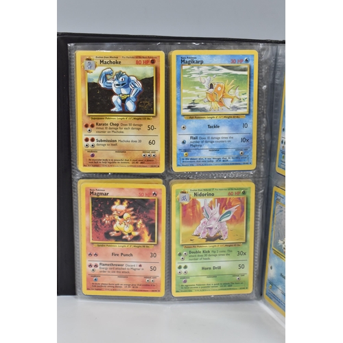 448 - TWO FOLDERS OF POKEMON CARDS, includes cards from the Base Set, Jungle, Fossil, Team Rocket and Prom... 