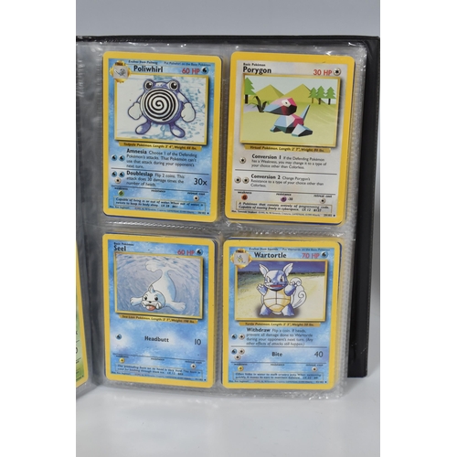 448 - TWO FOLDERS OF POKEMON CARDS, includes cards from the Base Set, Jungle, Fossil, Team Rocket and Prom... 