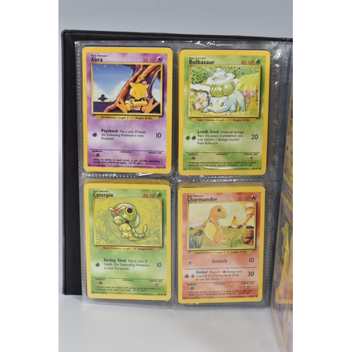 448 - TWO FOLDERS OF POKEMON CARDS, includes cards from the Base Set, Jungle, Fossil, Team Rocket and Prom... 