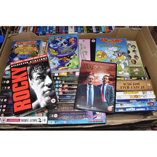 451 - NINE BOXES OF DVDS to include approximately four hundred and fifty films, boxsets, and TV shows to a... 