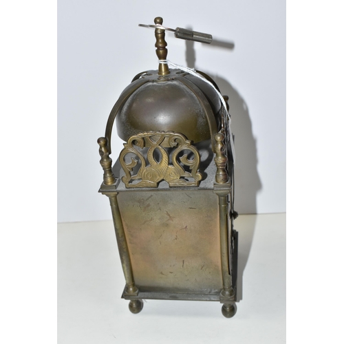 466 - A SMITHS EIGHT DAY LANTERN CLOCK, with brass case decorated with pierced and engraved dolphin/fish m... 