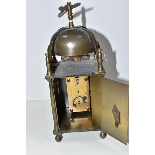 466 - A SMITHS EIGHT DAY LANTERN CLOCK, with brass case decorated with pierced and engraved dolphin/fish m... 