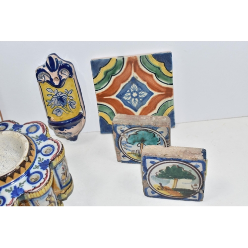 471 - A GROUP OF CONTINENTAL CERAMICS, comprising a tin glazed faience inkwell of lobed form, with central... 