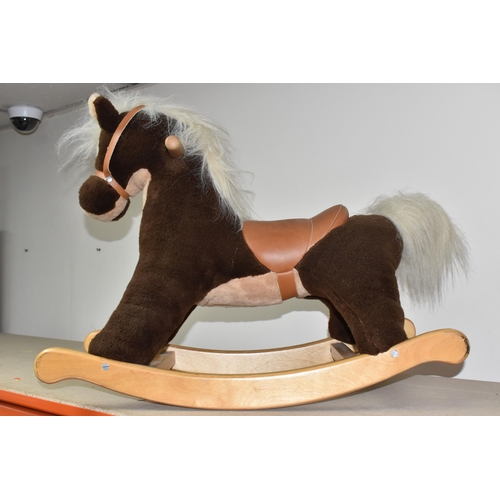 484 - A VINTAGE MAMAS AND PAPAS ROCKING HORSE, a Mamas and Papas child's plush rocking horse with a tan sa... 