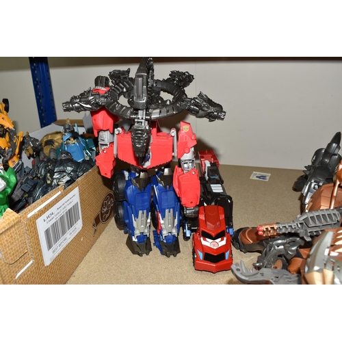 490 - ONE BOX AND LOOSE TRANSFORMER TOYS, a selection of vintage and modern transformer figures, approxima... 