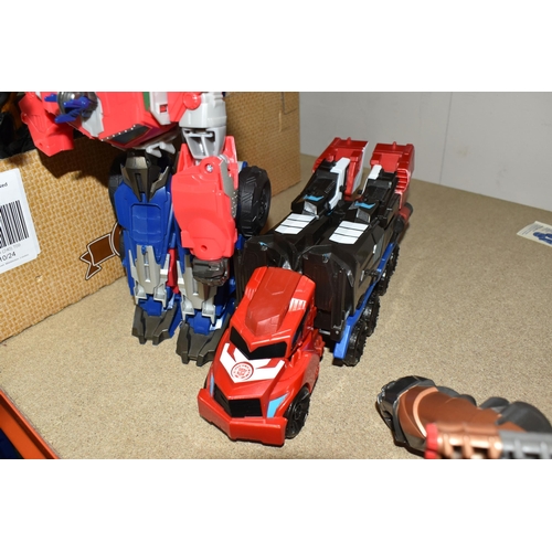 490 - ONE BOX AND LOOSE TRANSFORMER TOYS, a selection of vintage and modern transformer figures, approxima... 