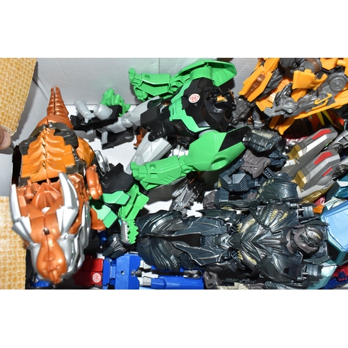 490 - ONE BOX AND LOOSE TRANSFORMER TOYS, a selection of vintage and modern transformer figures, approxima... 