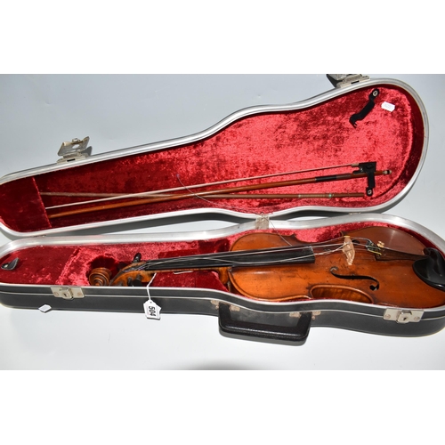 504 - A CASED VIOLIN AND BOW with a two piece back, two fine tuners installed, addition bow stick within t... 