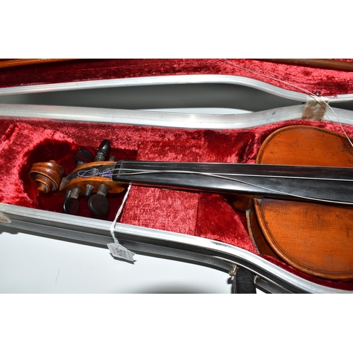 504 - A CASED VIOLIN AND BOW with a two piece back, two fine tuners installed, addition bow stick within t... 