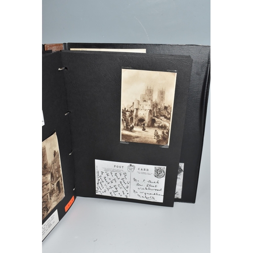 512 - FOUR ALBUMS OF POSTCARDS containing approximately 180 miscellaneous Postcards dating from the early ... 