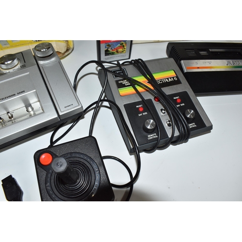 514 - THREE VIDEO GAME SYSTEMS BOXED, includes an Atari 2600 (with Centipede and a controller), Spectrum 6... 