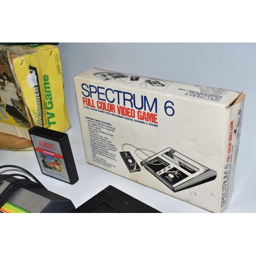 514 - THREE VIDEO GAME SYSTEMS BOXED, includes an Atari 2600 (with Centipede and a controller), Spectrum 6... 