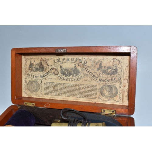 515 - A VICTORIAN 'IMPROVED PATENT MAGNETO ELECTRIC MACHINE FOR NERVOUS DISEASES', in mahogany case with i... 