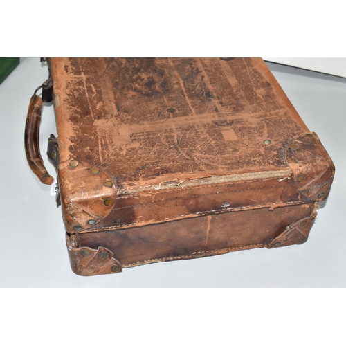 521 - A LEATHER SUITCASE SAID TO HAVE BEEN OWNED BY T.E. LAWRENCE OF ARABIA, approximate dimensions -  wid... 