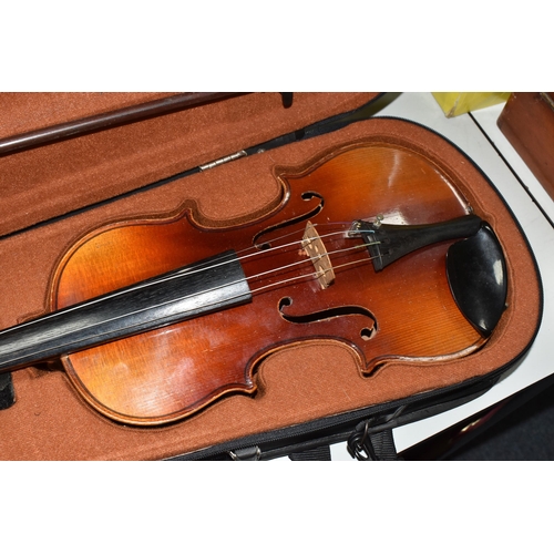 522 - A CASED VIOLIN AND BOW, an unmarked two piece backed violin with one fine tuner installed (1) (Condi... 