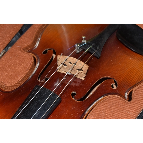 522 - A CASED VIOLIN AND BOW, an unmarked two piece backed violin with one fine tuner installed (1) (Condi... 