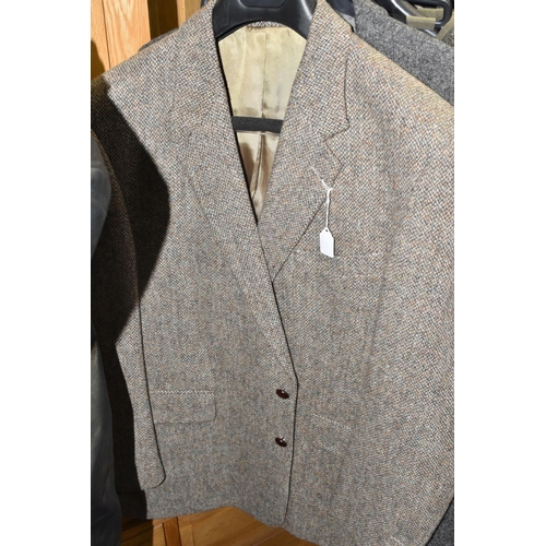 594 - A GROUP OF GENTLEMEN'S CLOTHING, sixteen items comprising an unused M&S 'Slim Fit' black suit, UK si... 