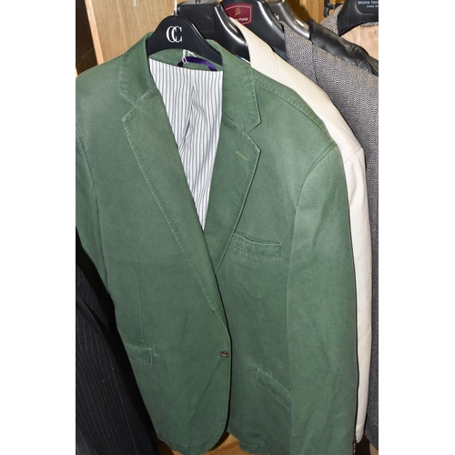 594 - A GROUP OF GENTLEMEN'S CLOTHING, sixteen items comprising an unused M&S 'Slim Fit' black suit, UK si... 