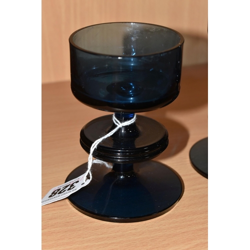 328 - TWO MID CENTURY WEDGWOOD NAVY GLASS CANDLESTICKS, comprising two blue glass Sheringham candlestick h... 