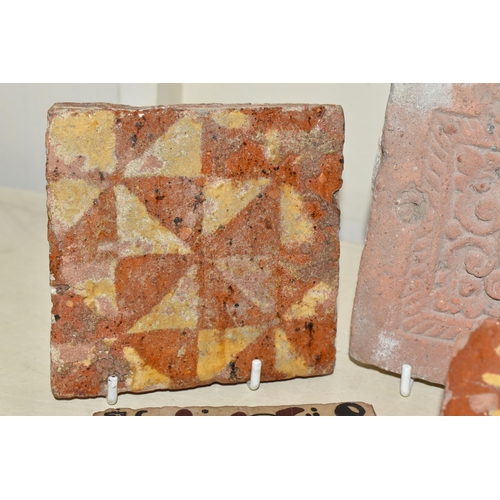 358 - THREE MEDIEVAL TILES AND A REPRODUCTION MEDIEVAL SOCARRAT TILE comprising a partially glazed geometr... 