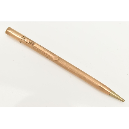 214 - A 9CT GOLD PROPELLING PENCIL, engine turned pattern with vacant cartouche, hallmarked 9ct London, ru... 