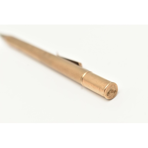 214 - A 9CT GOLD PROPELLING PENCIL, engine turned pattern with vacant cartouche, hallmarked 9ct London, ru... 