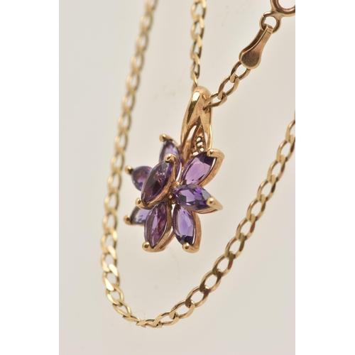 31 - A 9CT GOLD GEM SET PENDANT AND CHAIN, a floral designed pendant set with eight marquise cut amethyst... 