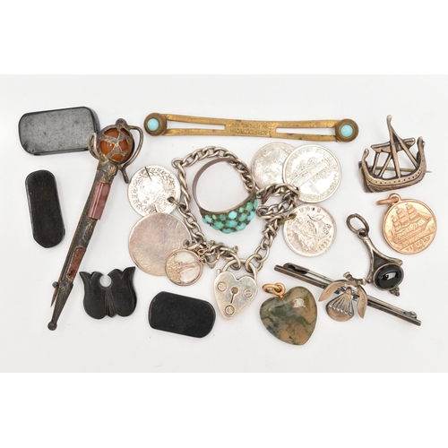 59 - A SMALL BAG OF ASSORTED ITEMS, to include a white metal Viking ship brooch stamped 'Silver' fitted w... 