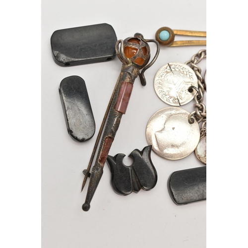 59 - A SMALL BAG OF ASSORTED ITEMS, to include a white metal Viking ship brooch stamped 'Silver' fitted w... 