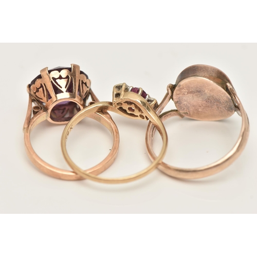 10 - THREE GEM SET RINGS, the first a 9ct yellow gold three stone ring set with a circular cut ruby and t... 