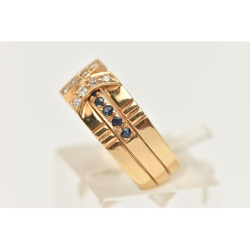 32 - A YELLOW METAL DIAMOND AND SAPPHIRE SET RING, three bands with the centre able to rotate set with a ... 